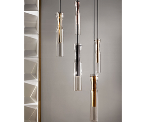 Designed by Massimo Castagna for Gallotti&Radice Suspension lamp with integrated LED light (not dimmable). Hand-shaped transparent crystal cylinders. Metal parts in polished, satin, hand burnished, black chromed or coppered brass. Black bronzed metal ceiling rose. Supplied with 4mt cable to adjust the height. On request, sets of 3 and 5 lamps with a single canopy can be produced.   Actual product may vary from images shown on website. Please contact info@rifugiomodern.com  for finish and fabric samples.