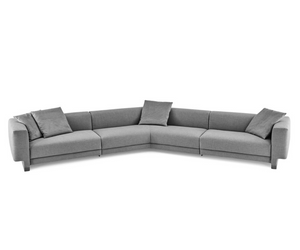 Designed by Massimo Castagna Modular sofa in non-deformable foam polyurethane in different density and polyester fibre with wooden inside structure.Rests on feet made of thermoplastic material. Capitonné back. Mixed down padding backrest cushions. Available covered by fabric or leather as per sample. Decorative polyester fibre cushions, on request. Not removable cover. Actual product may vary from images shown on website. Please contact info@rifugiomodern.com  for finish and fabric samples.