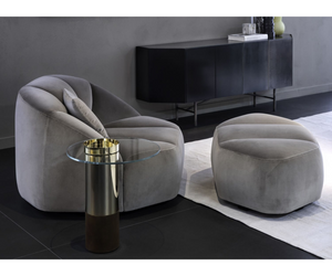 Designed by Massimo Castagna  Pouffe in non-deformable foam polyurethane in different density and polyester fibre with wooden inside structure. Black lacquered wooden feet. Available covered by fabric or leather as per sample. Not removable cover.   Inches (W x D x H) 34¾" x 32½" x 16¾" 43½" x 41¾" x 16¾" 44½" x 26½" x 16¾" 43½" x 26½" x 16¾"  Actual product may vary from images shown on website. Please contact info@rifugiomodern.com  for finish and fabric samples.