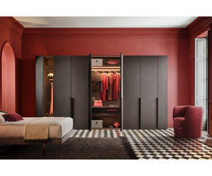 The slim, uninterrupted line of the frame draws a discreet and minimal outline. In lacquered or black anodized aluminium, it punctuates the run of vertical modules or tends to blend in when coordinated with the surface finish of the doors available in lacquered glass, mirror, wood and textured finishes as well as man-made leather and matt or gloss lacquers.  Actual product may vary from images shown on website. Please contact info@rifugiomodern.com for finish and fabric samples.