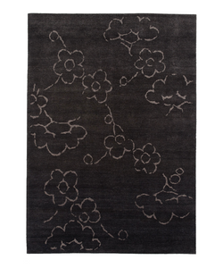 Kristiina Lassus Design  The pattern of the Okoa rug has its origins in Japanese visual culture. Ume, the delicate plum blossom, is an important symbol in Japanese art and poetry signifying hope and vitality. Okoa is a modern interpretation of this classic theme, scaled up to a large floral pattern for a more graphic and abstract feeling.  Actual product may vary from images shown on website. Please contact info@rifugiomodern.com for finish samples.