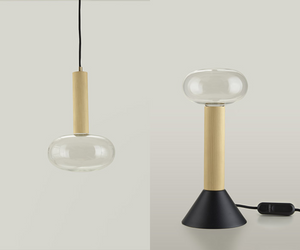 Sleek and dynamic, the Milù lamp collection is the product of a comforting, discreet design that still retains a unique, distinctive character. A knurled black or brass tube structure combines with a milk glass or clear glass shade to create a combination of materials that add a touch of lightness to rooms. 