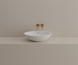 Designed by Benedini Association for Agape Made of white Cristalplant® biobased, the Spoon and Spoon XL washbasins can give life to multiple compositional possibilities: for example in the countertop version on a Flat XL oak top. The enlarged shapes of Spoon XL maintain its essential and enveloping elegance unaltered. Actual product may vary from images shown on website. Please contact info@rifugiomodern.com for fabric and finish samples. 