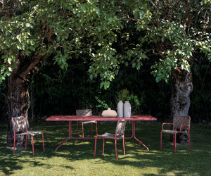 Brisa Outdoor furniture is available at Rifugio Modern. The pleasure of outdoor dining interpreted in many different ways: the Brise table group suggests new ways of thinking about the outdoor table, whether for many guests or a few close friends.
