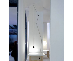 Designed by Beppe Merlano for Davide Groppi Neuro is a simple project, almost a revival of the old electrical wiring. A plug, a cable, some isolators, a socket and a led. The idea is to bring light wherever you like, starting from a wall socket. Design Plus by Light+Building, 2014 Award 