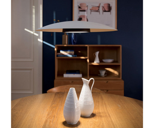Designed by Davide Groppi  It’s a new kind of suspension lamp with a rechargable battery. The light source is applied magnetically to a metal dish that hangs from the ceiling using a very thin steel wire. The effect is delicately elegant. QuiQuoQua allows light to be taken where it is needed, without the limitation of electric wires. QuiQuoQua: the light where you want it.  RECHARGEABLE LITHActual product may vary from images shown on website. Please contact info@rifugiomodern.com  for finish samples.