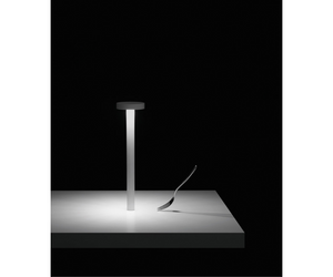 Davide Groppi Design ABS - Methacrylate - Metal Table lamp with magnetic base On-Off switch with Touch technology  RECHARGEABLE BATTERY 4,8 V DC - NiMH 4300 mAh - BATTERY LIFE TWELVE HOURS LED 2 W Actual product may vary from images shown on website. Please contact info@rifugiomodern.com  for finish samples. 