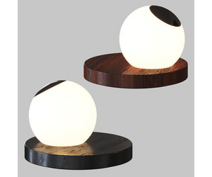 Omar Carragli Design for Davide Groppi Wood - Glass Table lamp with dimmer  Pigreco is rigorous in its design, putting together two essential, concrete and tangible materials: wood and glass. The crystal ball, in part made of frosted glass, can be positioned as one desires, functioning both as diffusor and convex lens. 24 V DC LED 6,5 W - 450 lm Actual product may vary from images shown on website. Please contact info@rifugiomodern.com  for finish samples. 