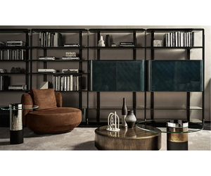 Designed by Oscar and Gabriele Buratti for Gallotti&Radice System with black anodized aluminum uprights with polished brass details. Shaped shelves in 8mm Italy gray tempered glass, bright black back-painted.  Actual product may vary from images shown on website. Please contact info@rifugiomodern.com  for finish and fabric samples.