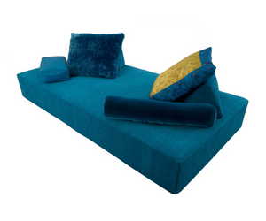 Designed by Francesco Binfaré for Edra  Relax in total absence of constraints, inspired by oriental influences.  Comfort assured by the softness of the rectangular sommier padded in Gellyfoam® and synthetic wadding, accompanied by a series of supports: two triangular Thai cushions to use as back supports, two large square pillows, and two armrests, one rectangular and one cylinder  Actual product may vary from images shown on website. Please contact info@rifugiomodern.com  for finish and fabric samples