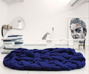Designed by Fernando e Humberto Campana for Edra It is a large woven nest. A soft embrace. An invitation to explore different positions lying between its pillows. You can sit on it, lie down or curl up. With no frame, it consists of 120 meters of tube filled with flexible and breathable polyurethane with a touch of goose feather.  Actual product may vary from images shown on website. Please contact info@rifugiomodern.com  for finish and fabric samples