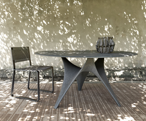 Arc Coffee Table from Molteni&C is available at Rifugio Modern. Foster + Partners’ Arc sculpture table joins the outdoor proposal with an all-cement finish. The outdoor proposal, which is configured in a single dimension, is available in the colour Dolomite grey in all its components, resulting in a sculptural table with a mono-material and monochrome Dolomite grey essence.  Edit alt text