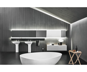 Designed by Benedini Association for Agape  Drop characterizes the bathroom in a unique manner changing the way to live this ambience thanks to a dynamic and unconventional style and a wide choice of materials. The family is composed by a column washbasins for wall mounting or freestanding; or as worktop basin in two sizes.  Actual product may vary from images shown on website. Please contact info@rifugiomodern.com for fabric and finish samples.
