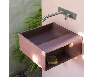 Designed by Benedini Association for Agape This compact, square shaped hand basin in white Cristalplant® biobased is perfect for installation in any type of space, giving it a unique stylish look. Without side storage compartment, it can be combined with wall-mounted or single-hole tap fittings. Actual product may vary from images shown on website. Please contact info@rifugiomodern.com for fabric and finish samples.