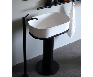 Designed by Neri & Hu for Agape The Immersion washbasin, with a matt black-coated floor-standing metallic support, is the ideal complement for the bathtub of the same name, inspired by the tradition of oriental timber bathing vessels. The compact size of this washbasin makes it suitable for confined living spaces as well.  Actual product may vary from images shown on website. Please contact info@rifugiomodern.com for fabric and finish samples.