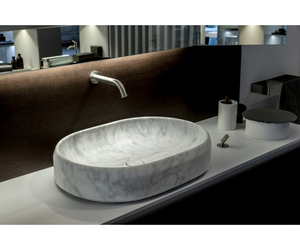 Designed by Patricia Urquiola for Agape The Lariana set of bathroom elements is characterized by a harmonious contrast between geometric and fluid lines, which is also reflected in the option of combining various materials: including Cristalplant® biobased, marble in different shades and wood.  Actual product may vary from images shown on website. Please contact info@rifugiomodern.com for fabric and finish samples.