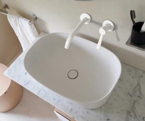 Designed by Benedini Association for Agape The Neb over countertop washbasin echoes the concept of the formal lightness of the bathtub of the same name. It combines a slimline profile with an extra-deep basin thanks to the use of a technologically advanced material Actual product may vary from images shown on website. Please contact info@rifugiomodern.com for fabric and finish samples.