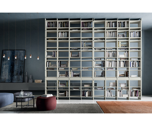 Regular, symmetrical geometrical designs evoke a reassuring sense of order. The modular Unless bookcase plays around with the idea of repetition, offering structures than can easily be expanded horizontally or vertically, created from one basic module. Actual product may vary from images shown on website. Please contact info@rifugiomodern.com for finish and fabric samples.