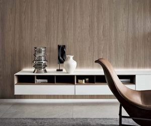 A modular system for each area of the house, which allows to create single and double-sided sideboards, tables, drawer units and suspended wall compositions. Actual product may vary from images shown on website. Please contact info@rifugiomodern.com for finish and fabric samples.