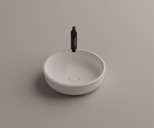 Designed by Benedini Association for Agape Undici washbasins, the name, italian for “eleven” comes from the characteristic that remains unchanged in the different versions: the height of 11 cm. Made of white solid surface with thermoforming processing, they are available in three shapes Actual product may vary from images shown on website. Please contact info@rifugiomodern.com for fabric and finish samples.