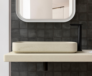Designed by Diego Vencato & Marco Marco Merendi for Agape Petra, self-bearing countertop realised in Cementoskin®, new type of concrete, resistant to any kind of dirt and with unique aesthetic features. The entire collection is inspired by the soft and natural finish of this material. Actual product may vary from images shown on website. Please contact info@rifugiomodern.com for fabric and finish samples.