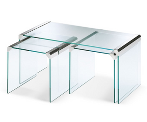 Designed by Pierangelo Galotti  Set of three coffee tables in 8mm transparent tempered glass. Also available in 8mm extralight or smoked “Grigio Italia” tempered glass. Bright stainless steel metal parts. Satin stainless steel or bright, satin brass or embossed white or black lacquered metal parts on request. Actual product may vary from images shown on website. Please contact info@rifugiomodern.com  for finish samples.