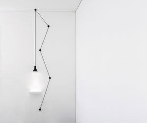 Designed by Beppe Merlano for Davide Groppi Neuro is a simple project, almost a revival of the old electrical wiring. A plug, a cable, some isolators, a socket and a led. The idea is to bring light wherever you like, starting from a wall socket. Design Plus by Light+Building, 2014 Award