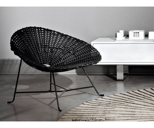 Designed by Paola Navone for Gervasoni  Weaving and sinuous shapes characterise the Sweet 27 armchair. The structure in matt black electrostatic painted metal tube is woven with matt black PVC. It is also available in the version with white structure and glossy white PVC.  Actual product may vary from images shown on website. Please contact info@rifugiomodern.com for finish and fabric samples.