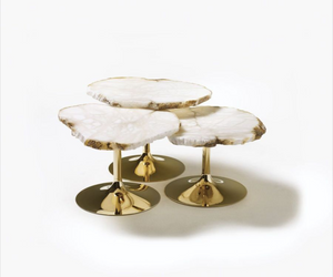 Designed by Jacopo Foggini for Edra Low tables with alabaster top and irregular and jagged edges, available in different heights and colors. The tops are cut by the crude “egg” of the evaporate mineral. The cone-shaped metal base is available in different heights and colors. Seen from above, they resemble islands.  Actual product may vary from images shown on website. Please contact info@rifugiomodern.com for fabric and finish samples.
