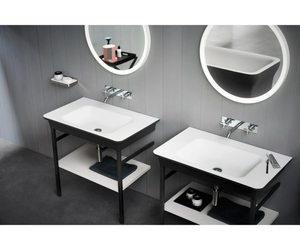 Designed by Benedini Association for Agape Novecento XL interprets in a modern way the forms of the past, transferring them in a new, important and inviting atmosphere. On both sides of this washbasin with sinuous shape, two large storage surfaces. Actual product may vary from images shown on website. Please contact info@rifugiomodern.com for fabric and finish samples.