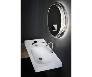 Designed by Benedini Association for Agape  Recessed Ottocento 001 washbasin. Functionality and elengace. They are also available in a version fully integrated in the Evoluzione and Flat XL tops. In the Flat XL programme, tops can be also in Carrara marble, Nero Marquina marble, green Alpi marble or Emperador dark marble.  Actual product may vary from images shown on website. Please contact info@rifugiomodern.com for fabric and finish samples.