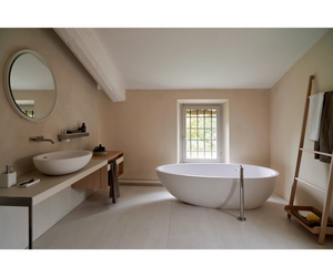 Designed by Benedini Association for Agape  Made of white Cristalplant® biobased, the Spoon and Spoon XL washbasins can give life to multiple compositional possibilities: for example in the countertop version on a Flat XL oak top. The enlarged shapes of Spoon XL maintain its essential and enveloping elegance unaltered.  Actual product may vary from images shown on website. Please contact info@rifugiomodern.com for fabric and finish samples.