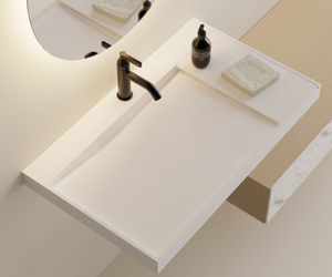 Designed by Benedini Association for Agape Litorale is a washbasin countertop with an uninterrupted linear basin available in lengths ranging from 80 to 240 cm. Only 6 cm thick, Litorale is manufactured in solid surface and it can be equipped with a number of trays available in three different sizes (20, 40 and 60 cm) Actual product may vary from images shown on website. Please contact info@rifugiomodern.com for fabric and finish samples.