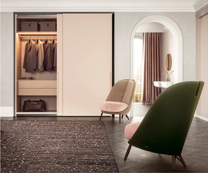 Aesthetic minimalism and functionality are an unbeatable combo. This wardrobe’s success lies in its consistent simplicity and in the power of its minimal lines. Tratto integrates and blends the door parts while carving the handle out of the panel. Vertically recessed near the edge of the door, it offers a sound grip on both hinged and sliding doors. Actual product may vary from images shown on website. Please contact info@rifugiomodern.com for finish and fabric samples. 