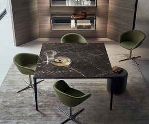 A system of tables with an essential and refined look, consistent with the unique Rimadesio philosophy. Actual product may vary from images shown on website. Please contact info@rifugiomodern.com for finish and fabric samples.
